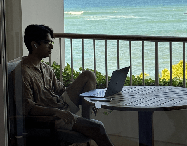 Arman Kassam coding in a tropical place